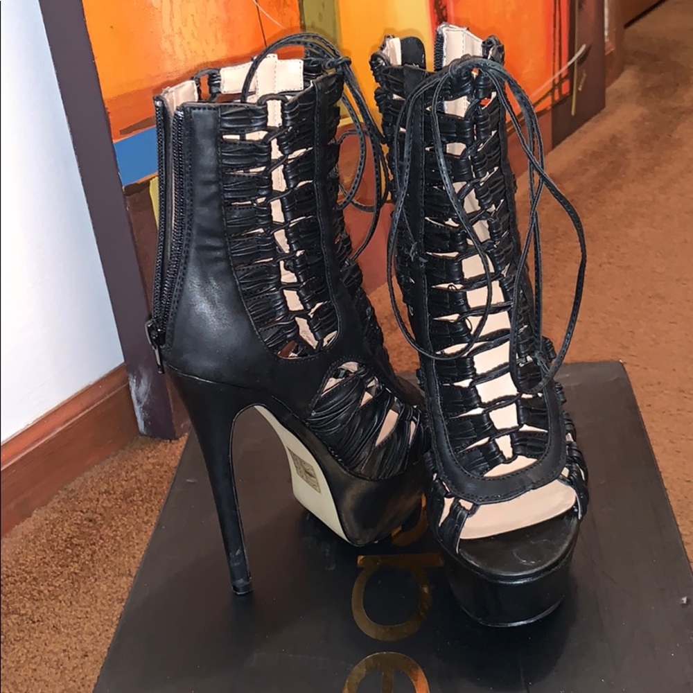 Black Leather Bebe Platform Heels